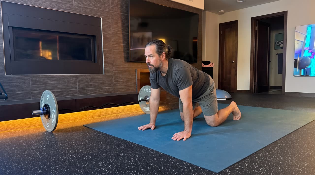 Illustrated scene of Keith practising yoga on the blue mat in his own studio.